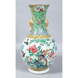 A GOOD 19TH CENTURY CHINESE FAMILLE ROSIE PORCRELAIN BOTTLE VASE, the body of the vase decorated