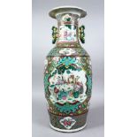A 19TH CENTURY CHINESE FAMILLE ROSE / VERTE PORCELAIN TWIN HANDLE VASE, the body with many panels