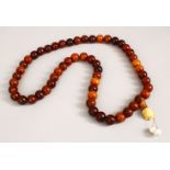 A SET OF CHINESE HORN & IVORY ROSARY BEAD NECKLACE, comprising of 55 sperical beads each approx .9cm