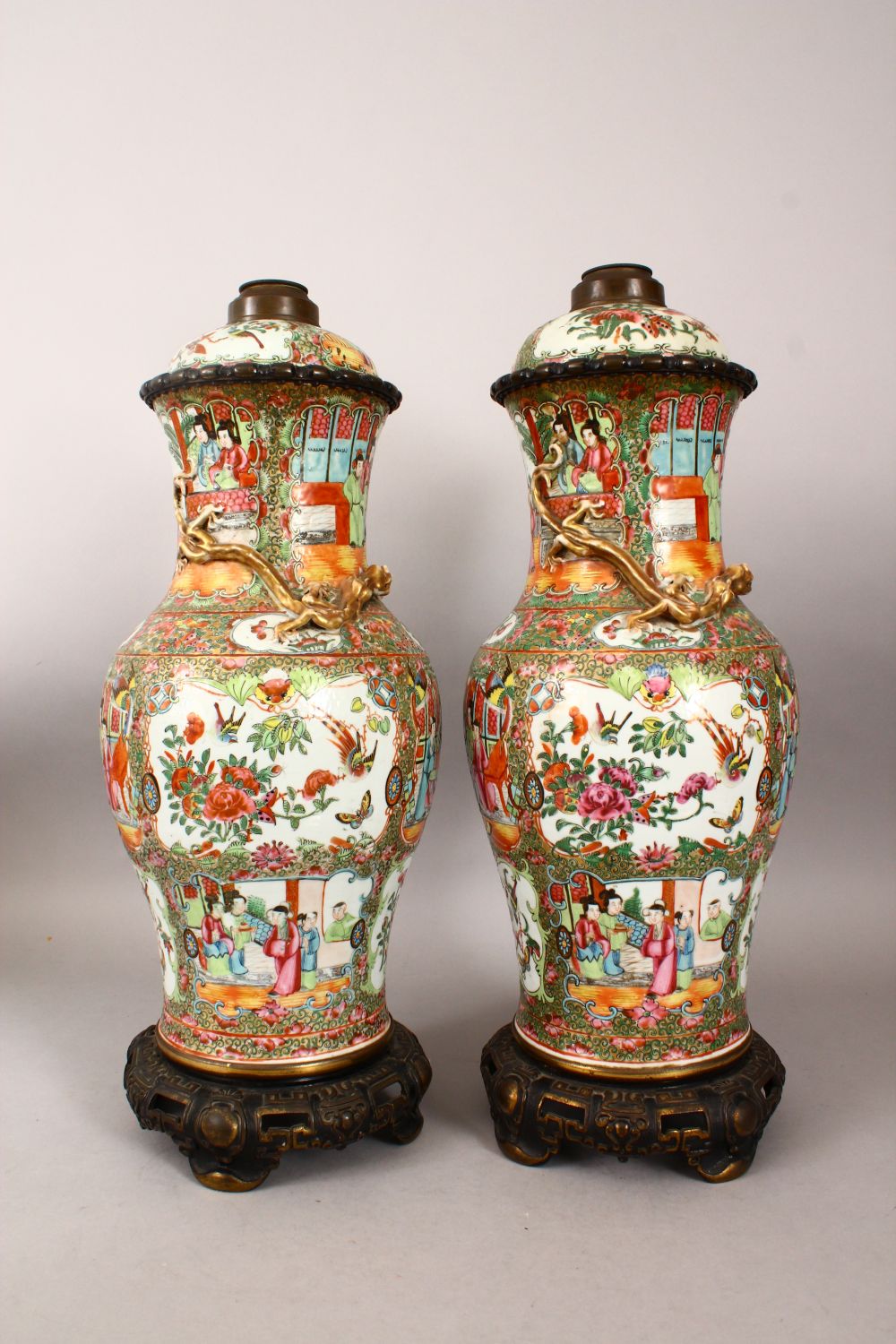 A PAIR OF CHINESE 19TH CENTURY CANTON PORCELAIN VASES / LAMPS, with panel decoration of figures, - Image 2 of 7