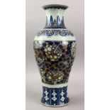 A 19TH CENTURY CHINESE BLUE, WHITE & IRON RED PORCELAIN BALUSTER VASE, decorated with