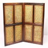 A 19TH CENTURY INDIAN PAPIER MACHE & WOOD PANELED DOUBLE SIDED FOLDING SCREEN, the panels