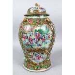 A LARGE 19TH CENTURY CHINESE CANTON FAMILLE ROSE PORCELAIN TEMPLE JAR & COVER, the body of the jar