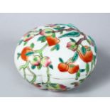 A GOOD 19TH CENTURY QIANLONG STYLE FAMILLE ROSE PORCELAIN PEACH BOX & COVER, in the form of a peach,