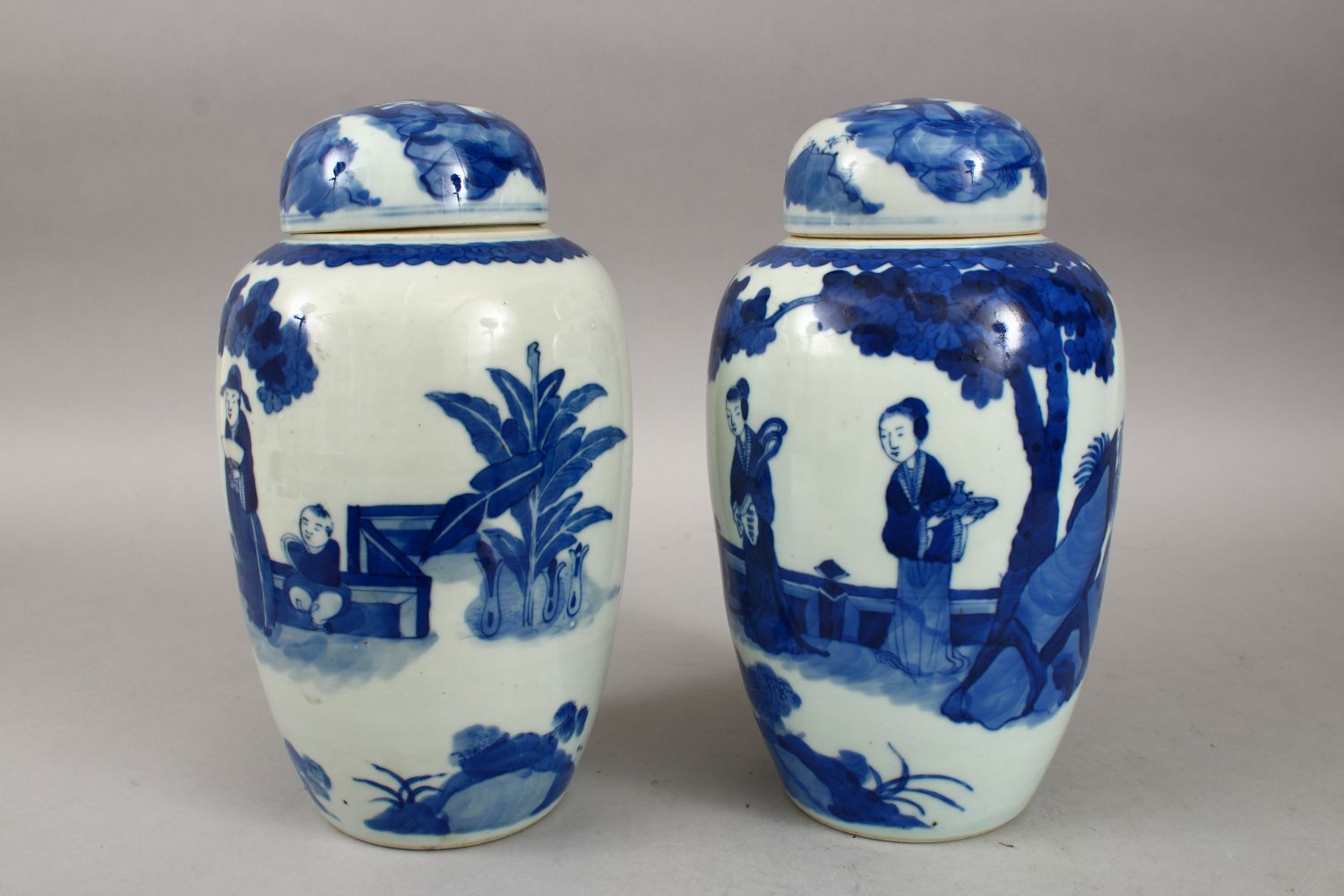 A PAIR OF 19TH CENTURY CHINESE BLUE & WHITE PORCELAIN JARS & COVERS, decorated with scenes of - Image 4 of 6