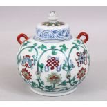 A SMALL CHINESE DOUCAI PORCELAIN JAR AND COVER, the body of the jar decorated with formal