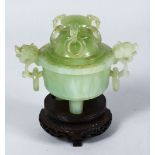 A SMALL 19TH / 20TH CENTURY CHINESE CARVED JADE CENSER & COVER, the censer with triple feet, lion