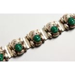 A SILVER .925 AND JADE BRACELET.