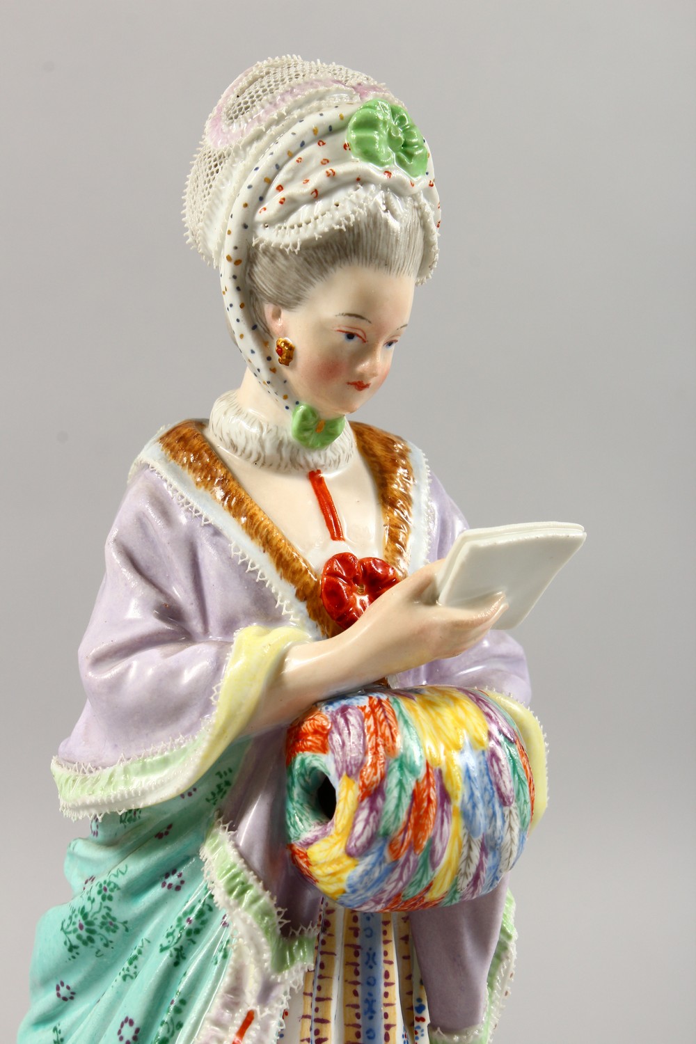 A GOOD 19TH CENTURY MEISSEN PORCELAIN FIGURE OF A LADY with muff, reading a book. Cross swords - Image 2 of 14