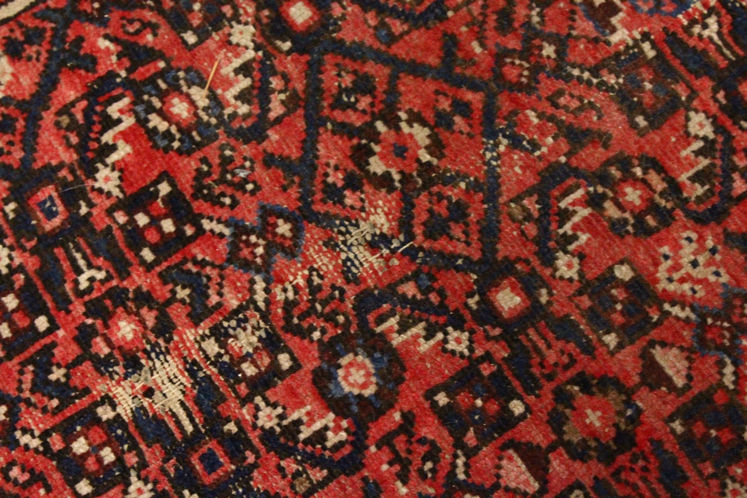 A PERSIAN RUG, 20TH CENTURY, red ground with central medallion, within a dark blue border. 6ft 10ins - Image 7 of 9
