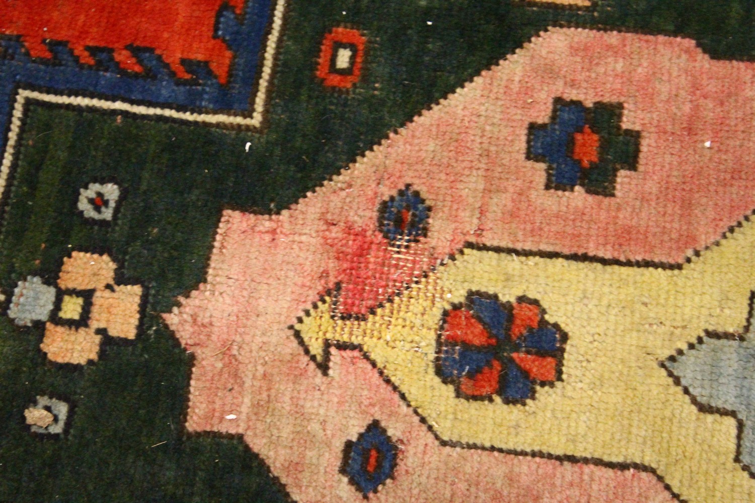 A PERSIAN RUG, 20TH CENTURY, bright red ground with large stylised design, within a similar double - Image 4 of 11