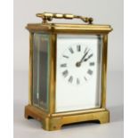 A 19TH CENTURY FRENCH BRASS TIMEPIECE CARRIAGE CLOCK. 4ins high.