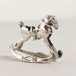 A NOVELTY SILVER ROCKING HORSE. 1.5ins long.