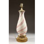 A MURANO STYLE GLASS TABLE LAMP, with ornate gilt metal base. 23ins high.