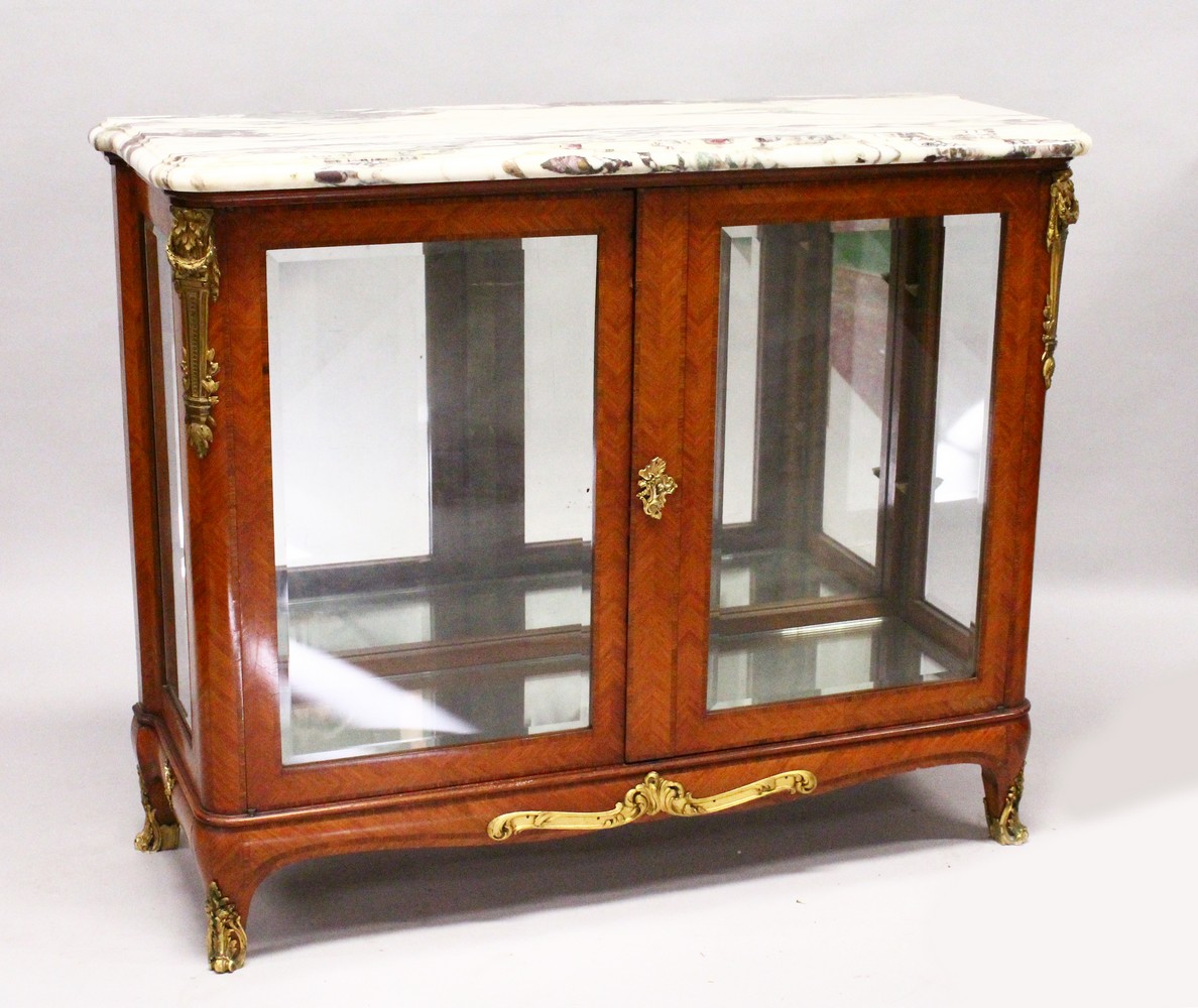 A GOOD FRENCH KINGWOOD, MARBLE AND ORMOLU CABINET by HENRY DASSON, with variegated marble top,