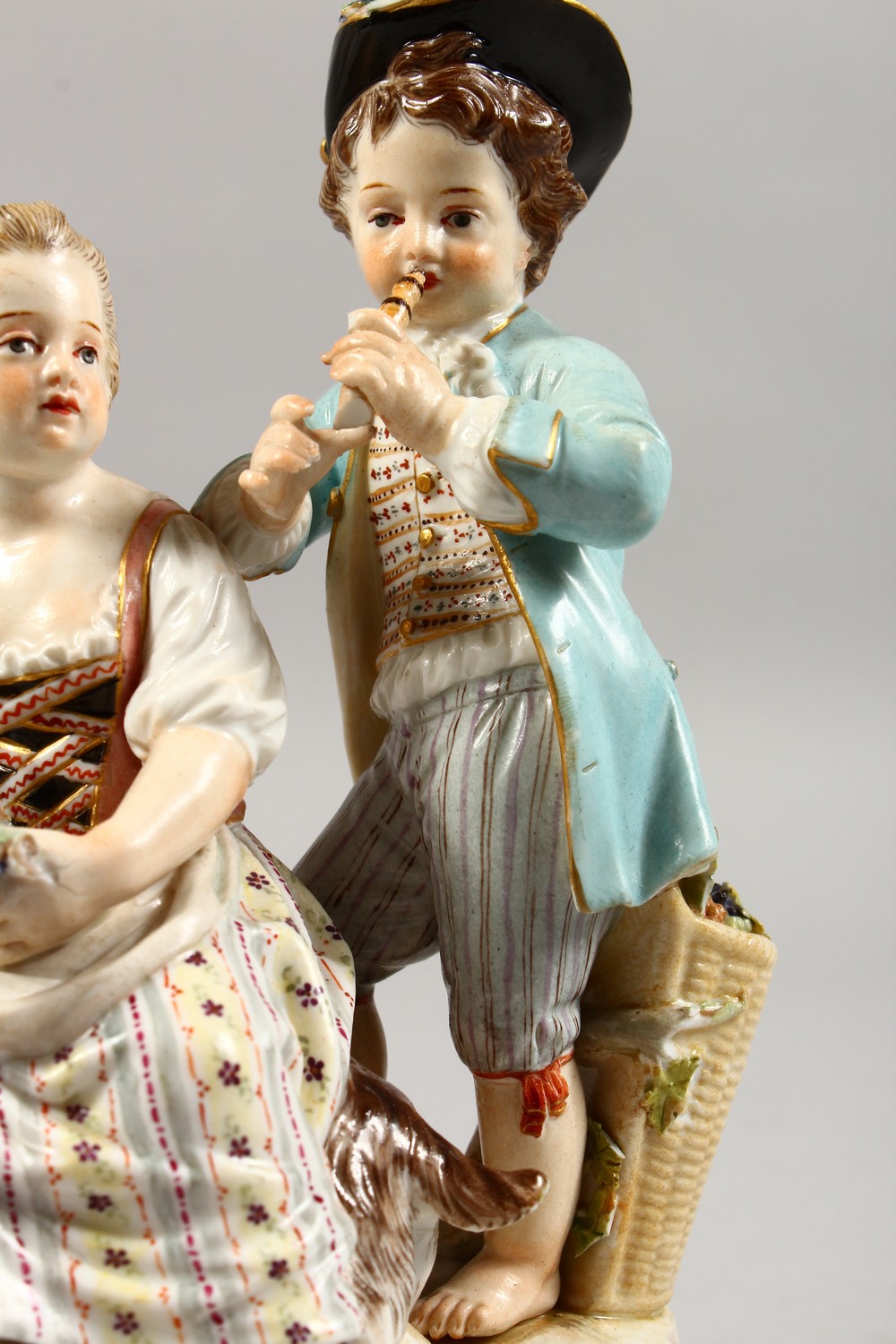 A 19TH CENTURY MEISSEN PORCELAIN GROUP OF A BOY AND GIRL, with goat and fruiting vines. Cross swords - Image 4 of 10