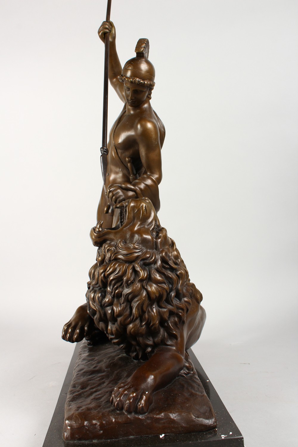 A GOOD BRONZE CLASSICAL GROUP, a Roman gladiator spearing a lion, on a marble base. 24ins high. - Image 2 of 6