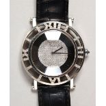 A VERY GOOD MOUSSAIEFF, ROMUS 18CT WHITE GOLD AND DIAMOND WRISTWATCH with leather strap.