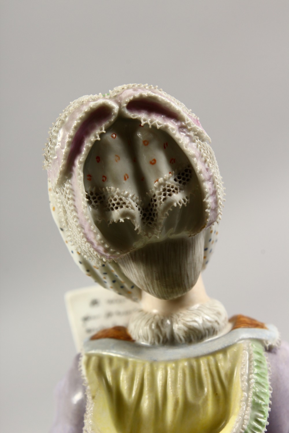 A GOOD 19TH CENTURY MEISSEN PORCELAIN FIGURE OF A LADY with muff, reading a book. Cross swords - Image 8 of 14