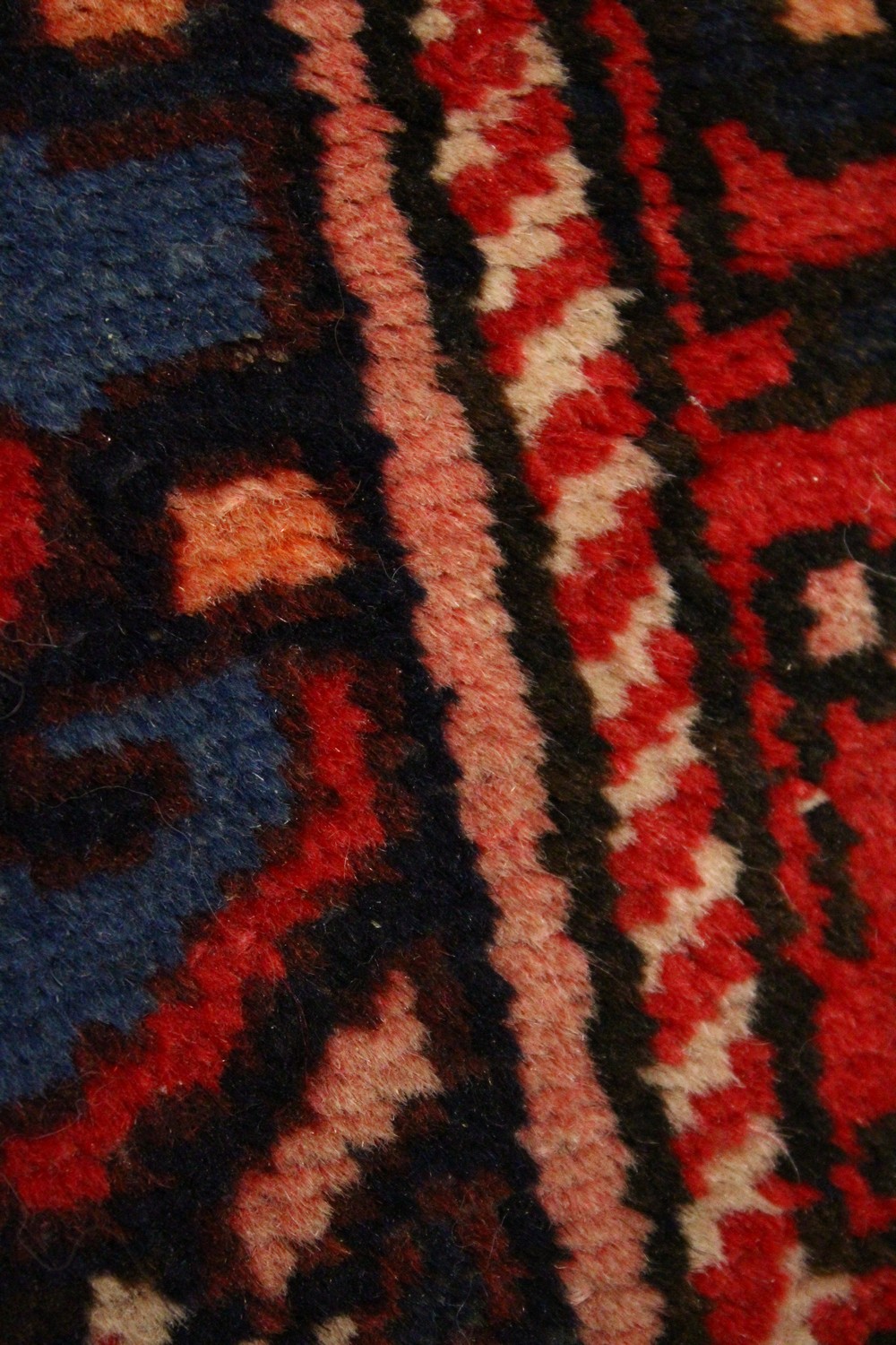 A PERSIAN RUG, 20TH CENTURY, red ground with central medallion, within a dark blue border. 6ft - Image 9 of 11