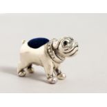 A NOVELTY SILVER BULLDOG PIN CUSHION. 1.5ins long.