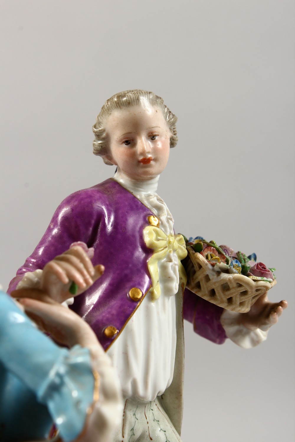 A 19TH CENTURY MEISSEN PORCELAIN GROUP OF A GALLANT AND LADY, with basket of fruit and flowers. - Image 2 of 8