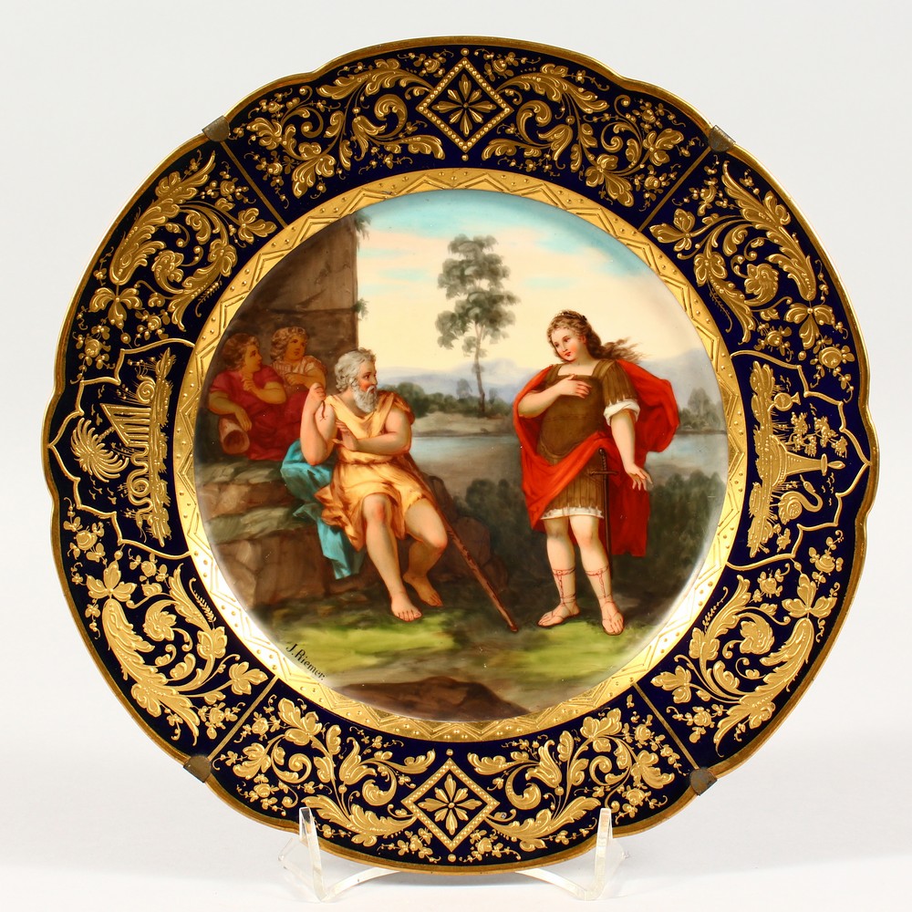 A SUPERB 19TH CENTURY VIENNA CIRCULAR PLATE, a classical scene by J. RIEMER. Beehive mark in blue.