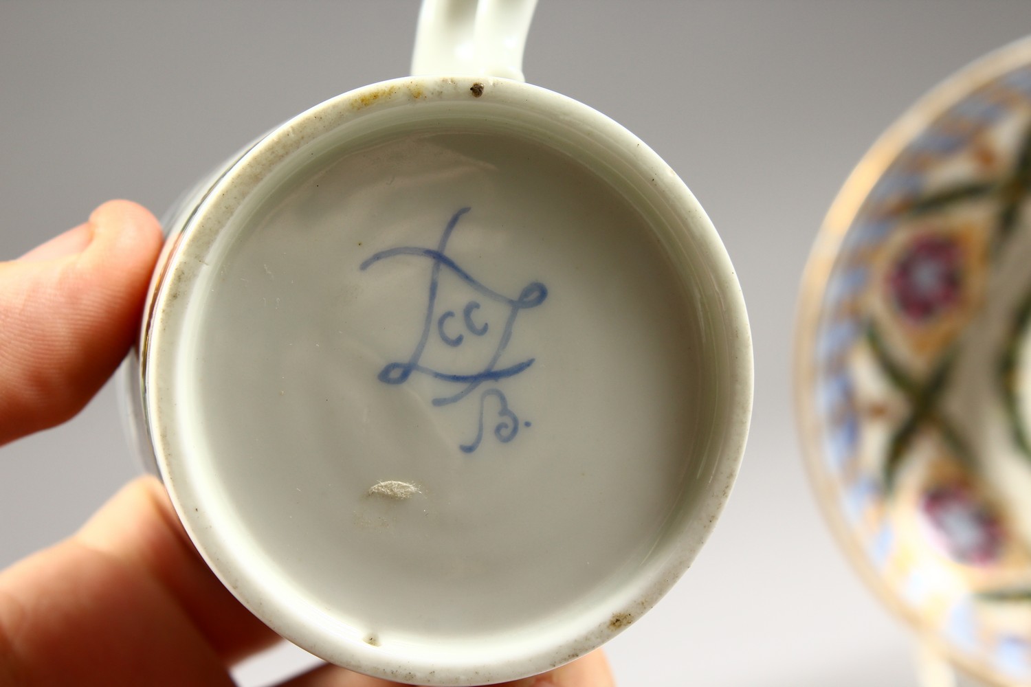 A GOOD 19TH CENTURY SEVRES COFFEE CAN AND SAUCER, painted with roses. Sevres mark and Initial C.C. - Image 7 of 10