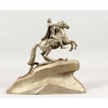 A RUSSIAN CAST ALUMINIUM GROUP, of a man on horseback, signed. 10.5ins long.