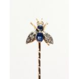 A GOLD, DIAMOND AND SAPPHIRE BUTTERFLY PIN.