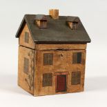 A PAINTED HOUSE STYLE TEA CADDY. 6.5ins wide.