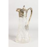 AN ART DECO GLASS CLARET JUG, with .800 silver handle and spout. 10.5ins high.