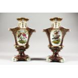 A GOOD PAIR OF MEISSEN SHAPED BLUE AND GILT GROUND VASES, painted with reverse panels of young