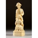 A NAPOLEONIC CARVED IVORY EROTIC GROUP of a man in a tricorn hat and young lady. 4.5ins high.