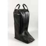 A BLACK VINYL BOOT BAG.