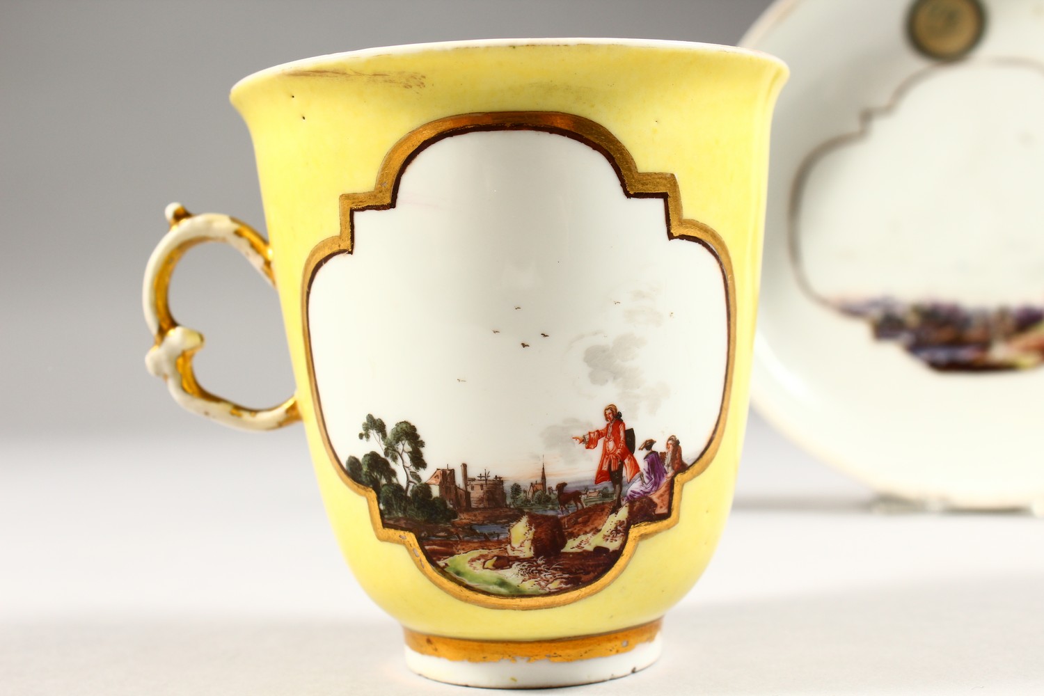 A SUPERB 18TH CENTURY MEISSEN CUP AND SAUCER, with yellow ground, the cup painted with two landscape - Image 6 of 13
