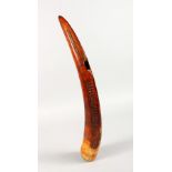 AN UNUSUAL CARVED IVORY TUSK PIPE OR MUSICAL INSTRUMENT, EARLY 20TH CENTURY, dark brown
