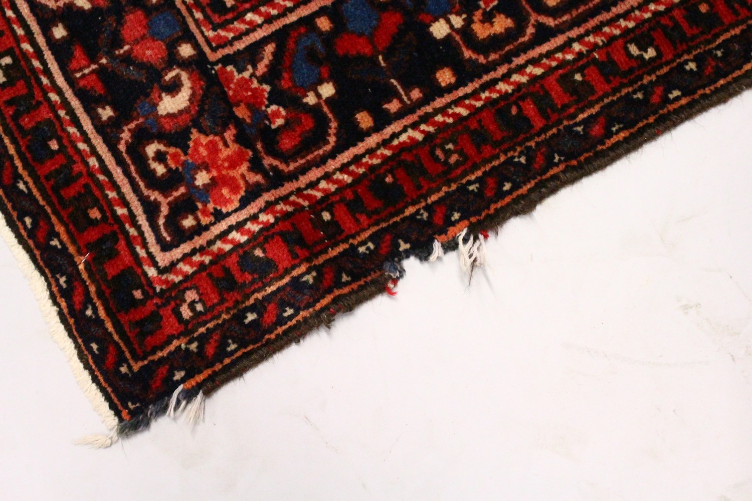 A PERSIAN RUG, 20TH CENTURY, red ground with central medallion, within a dark blue border. 6ft - Image 2 of 11