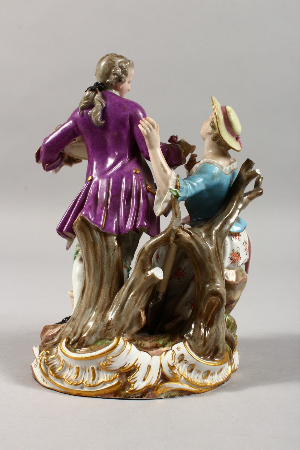 A 19TH CENTURY MEISSEN PORCELAIN GROUP OF A GALLANT AND LADY, with basket of fruit and flowers. - Image 4 of 8