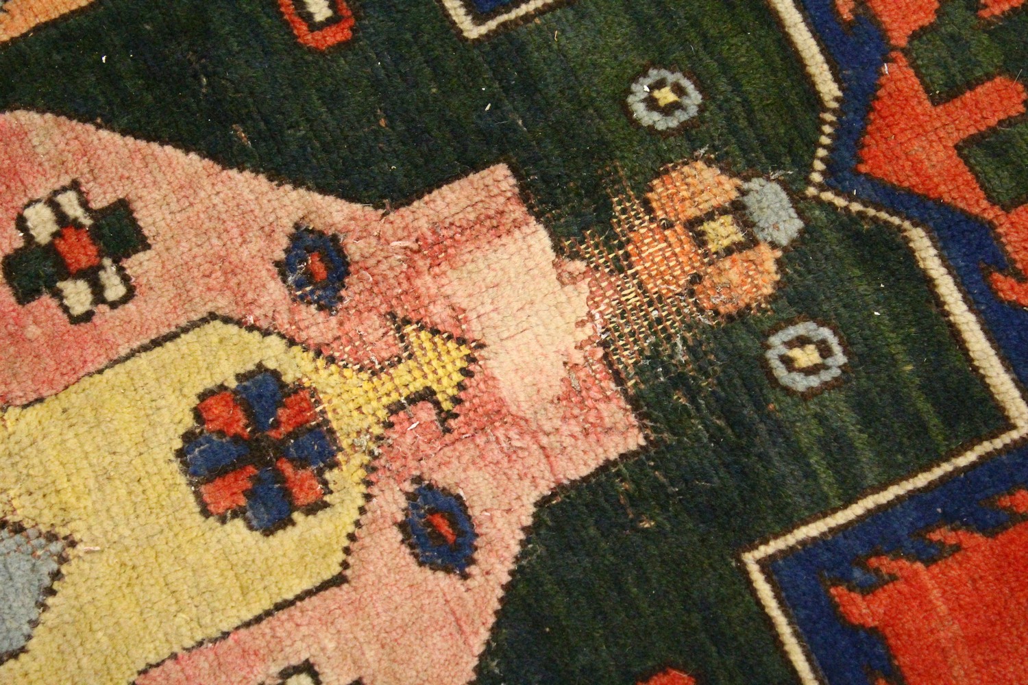 A PERSIAN RUG, 20TH CENTURY, bright red ground with large stylised design, within a similar double - Image 3 of 11