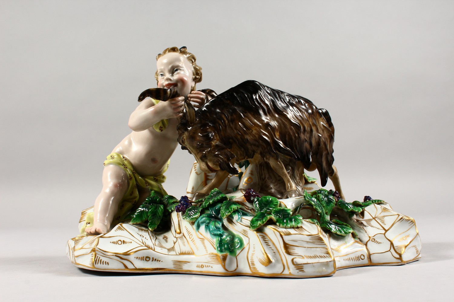 A GOOD MEISSEN PORCELAIN GROUP of a faun wrestling with a goat, on a gilt encrusted base. Incised - Image 2 of 8