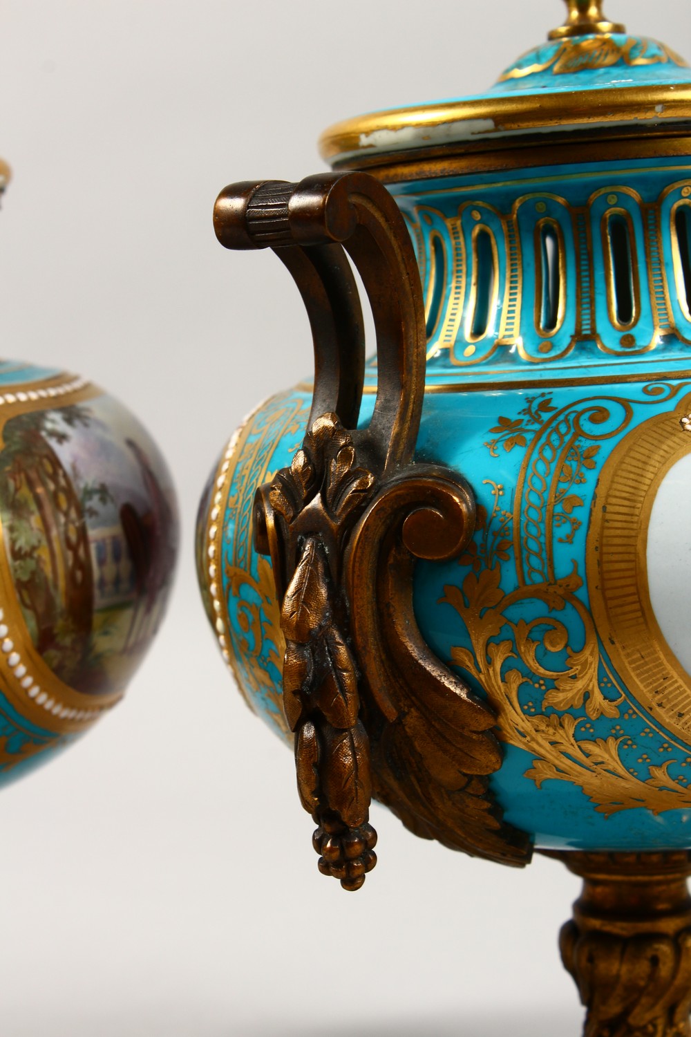 A SUPERB PAIR OF 19TH CENTURY SEVRES PORCELAIN URNS AND COVERS, pale blue ground, painted with - Image 8 of 14