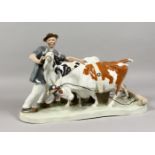 A LARGE MEISSEN PORCELAIN GROUP, farmer with two cows. Cross swords mark in blue. Incised H123.
