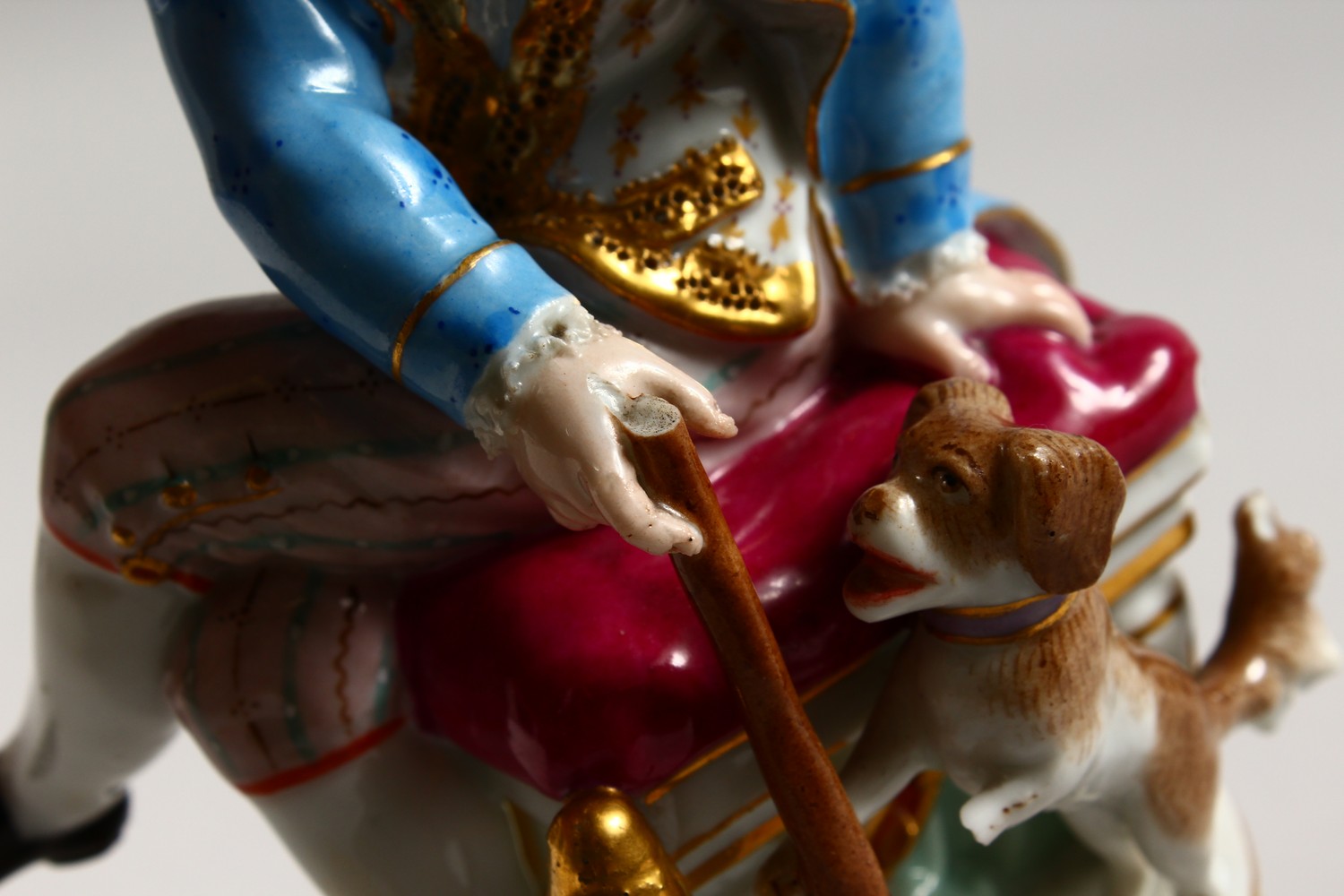 A 19TH CENTURY MEISSEN PORCELAIN FIGURE OF A BOY, seated on a stool holding a gun, dog by his - Image 6 of 13