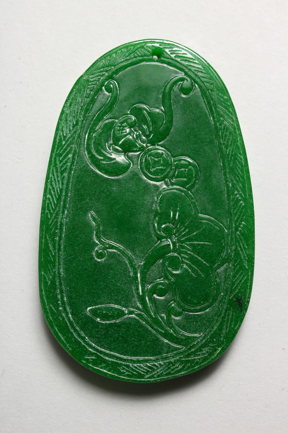 A LARGE CARVED APPLE GREEN JADE PENDANT. 3.75ins high. - Image 2 of 2