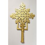 AN ECCLESIASTICAL PIERCED BRASS FINIAL. 13ins high.