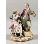 A 19TH CENTURY MEISSEN PORCELAIN GROUP OF A GALLANT AND LADY, with basket of fruit and flowers.