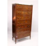 A 19TH CENTURY FRENCH MAHOGANY SEMAINIER, with brass galleried top, seven panelled drawers with