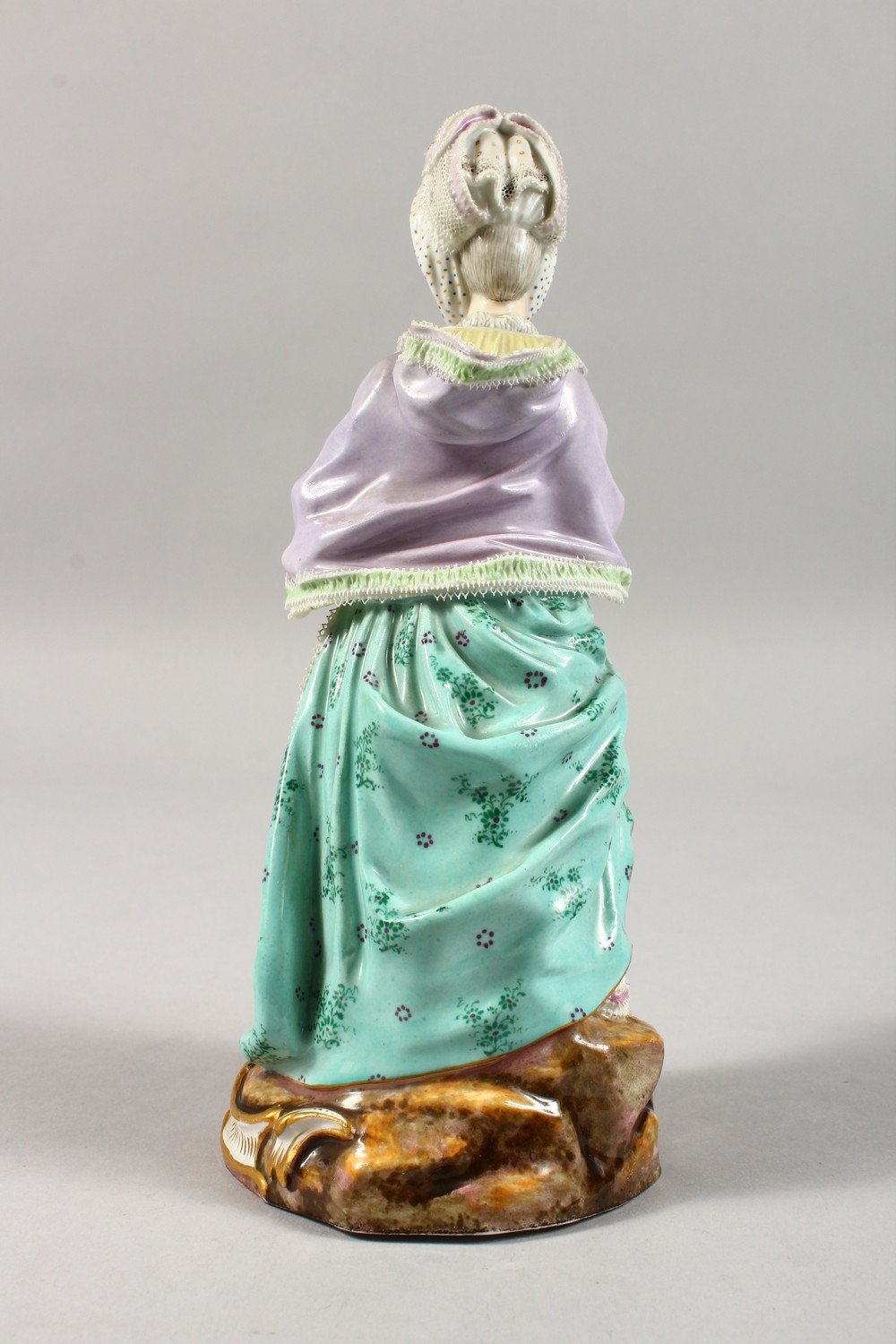 A GOOD 19TH CENTURY MEISSEN PORCELAIN FIGURE OF A LADY with muff, reading a book. Cross swords - Image 6 of 14