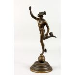 A SMALL BRONZE FIGURE OF MERCURY, 20TH CENTURY, on a circular base. 10ins high.